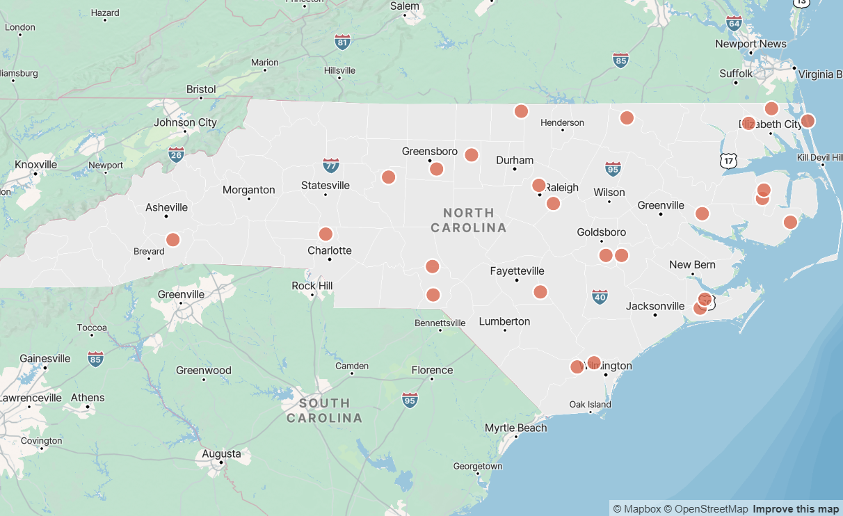 Point map showing locations as coral circles on gray background